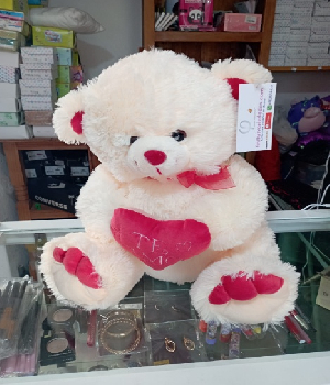 Imagen de Osito de peluche peludo con corazon de 40 cms