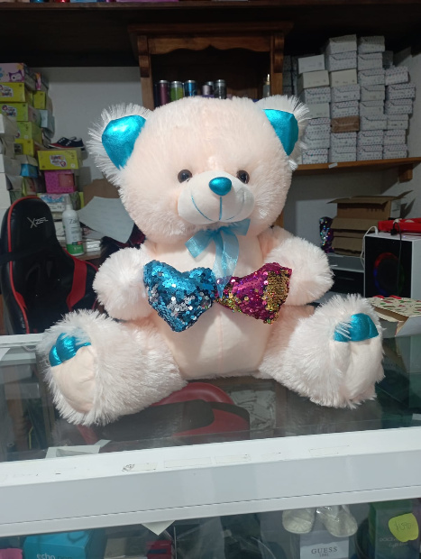 Imagen de Oso de peluche claro con detalles azules de 40 cm numero 1