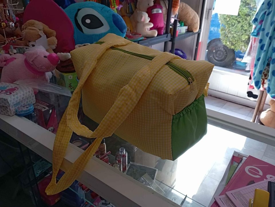 Imagen de Pañalera para bebe leoncito color verde con amarillo numero 1